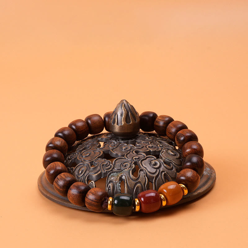 Pulsera de equilibrio de paz de palisandro de madera de ébano con Buddha Stones