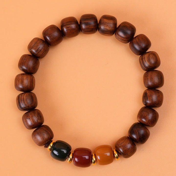 Pulsera de equilibrio de paz de palisandro de madera de ébano con Buddha Stones