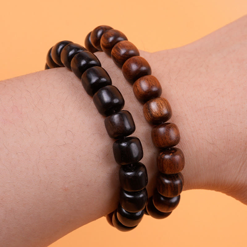 Pulsera de equilibrio de paz de palisandro de madera de ébano con Buddha Stones
