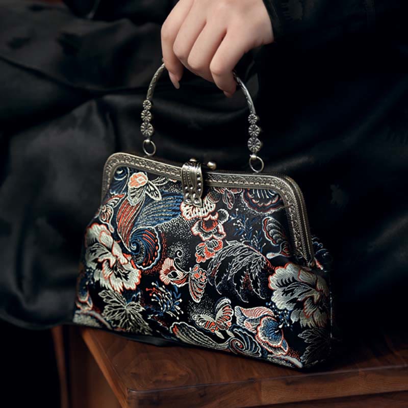 Bolso de mano con asa de metal y flores de mariposa y Buddha Stones