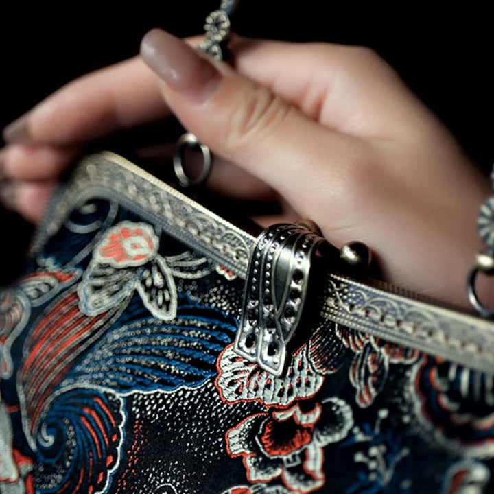 Bolso de mano con asa de metal y flores de mariposa y Buddha Stones