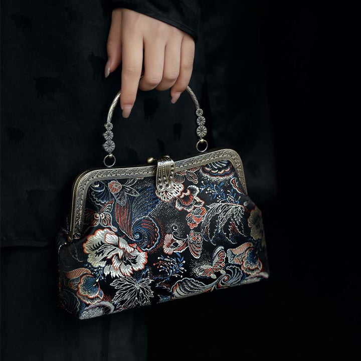 Bolso de mano con asa de metal y flores de mariposa y Buddha Stones