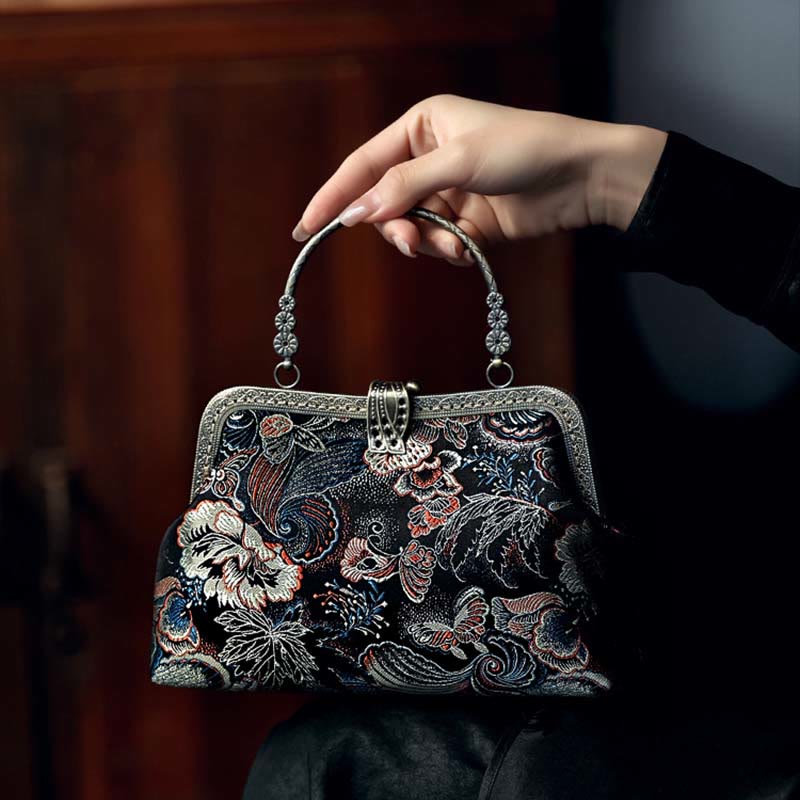 Bolso de mano con asa de metal y flores de mariposa y Buddha Stones