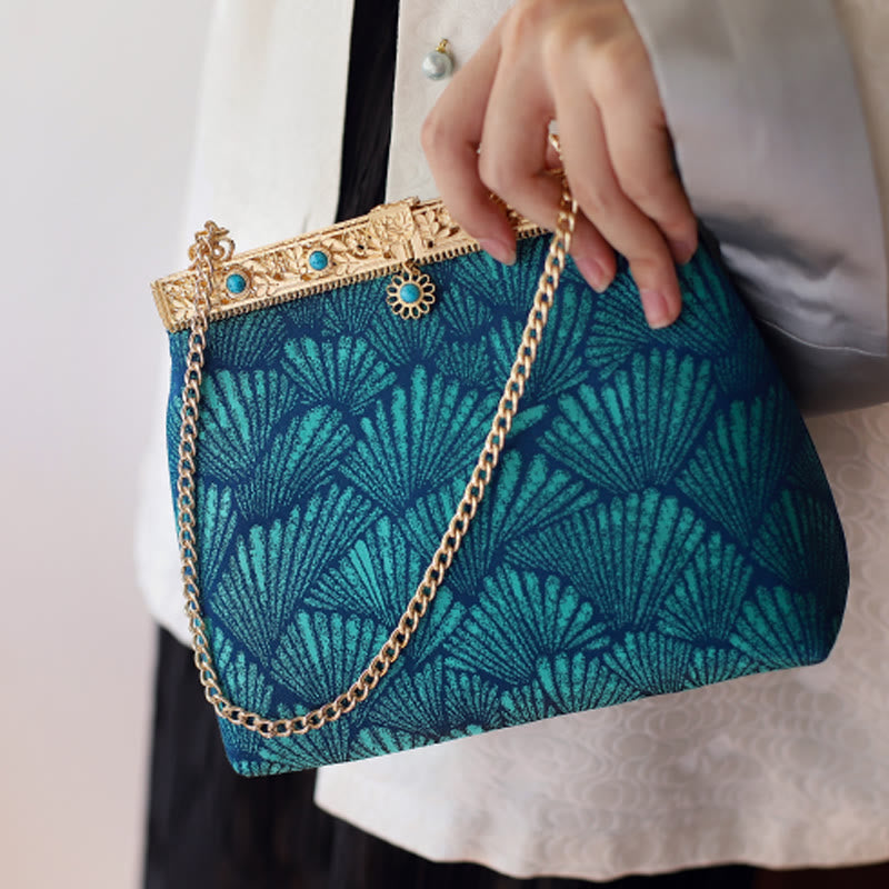 Bolso bandolera con cadena de metal con líneas azules y Buddha Stones