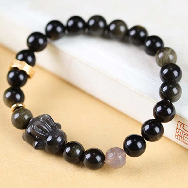 Buddha Stones Obsidiana con brillo dorado Obsidiana negra Obsidiana con brillo plateado Pulsera linda de protección de conejo