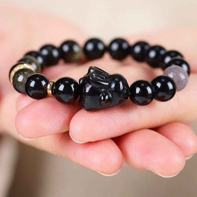 Buddha Stones Obsidiana con brillo dorado Obsidiana negra Obsidiana con brillo plateado Pulsera linda de protección de conejo
