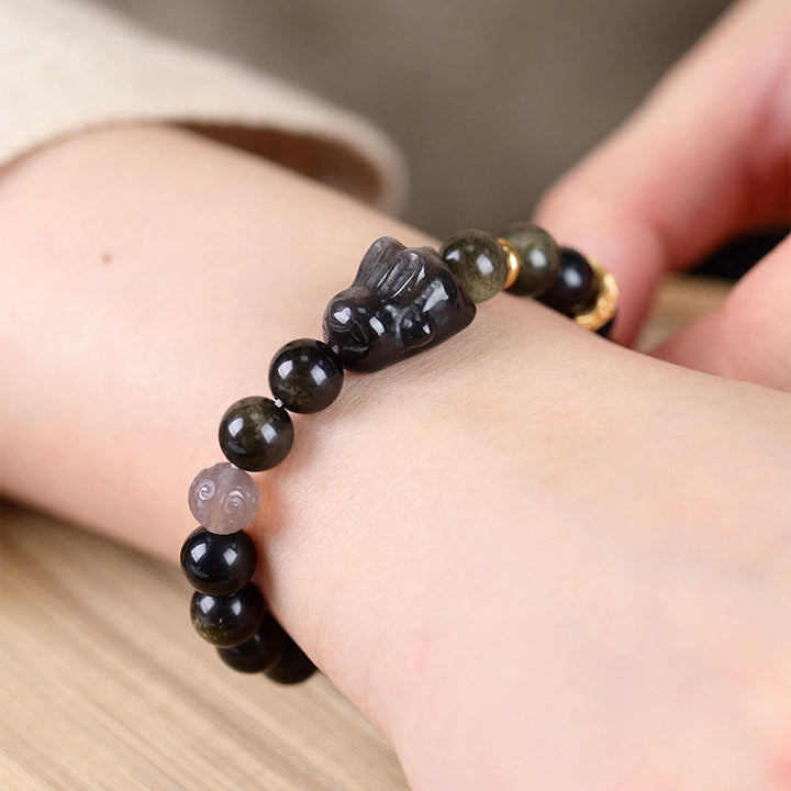 Buddha Stones Obsidiana con brillo dorado Obsidiana negra Obsidiana con brillo plateado Pulsera linda de protección de conejo