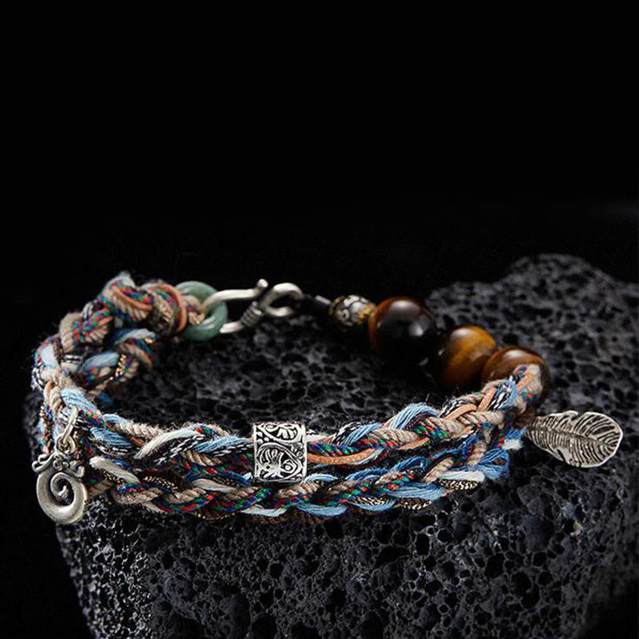 Pulsera de fuerza de voluntad hecha a mano con cuerda de algodón colorida y ojo de tigre de plata de ley 925 con Buddha Stones