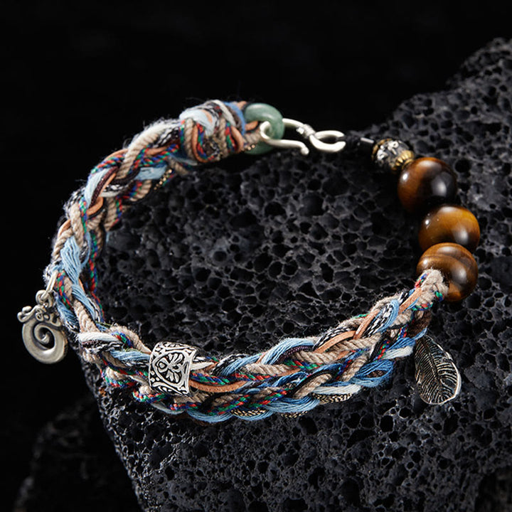 Pulsera de fuerza de voluntad hecha a mano con cuerda de algodón colorida y ojo de tigre de plata de ley 925 con Buddha Stones