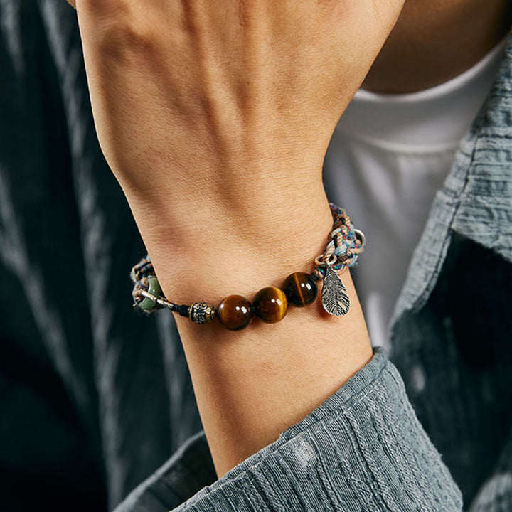 Pulsera de fuerza de voluntad hecha a mano con cuerda de algodón colorida y ojo de tigre de plata de ley 925 con Buddha Stones