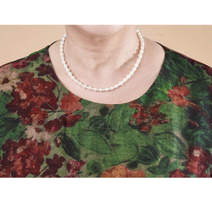 Vestido midi de manga corta con bolsillos y flores rojas y verdes de verano de talla grande con Buddha Stones