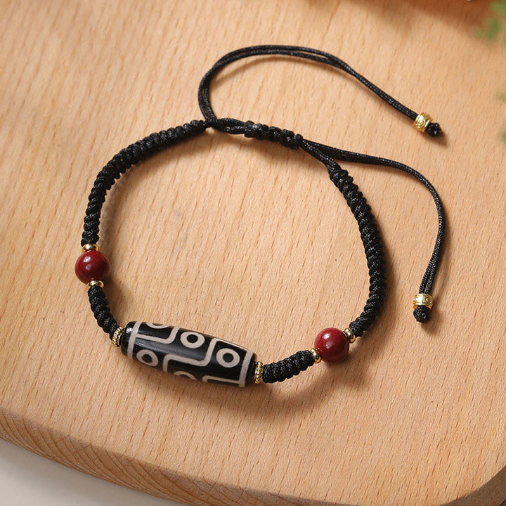 Pulsera de protección de cuentas Dzi tibetana de nueve ojos hecha a mano con Buddha Stones