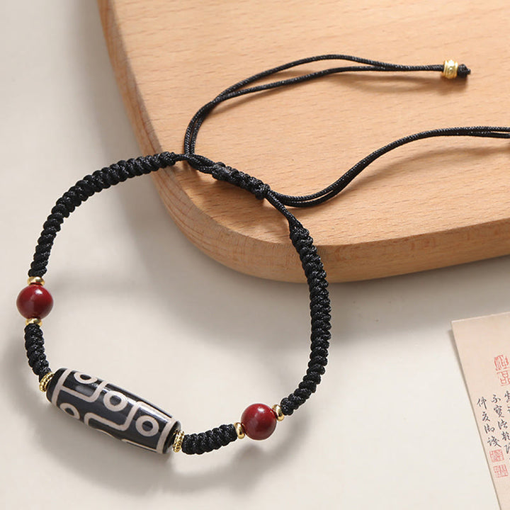 Pulsera de protección de cuentas Dzi tibetana de nueve ojos hecha a mano con Buddha Stones