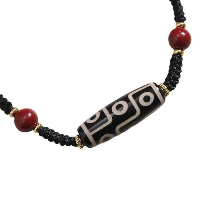 Pulsera de protección de cuentas Dzi tibetana de nueve ojos hecha a mano con Buddha Stones