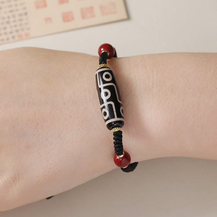 Pulsera de protección de cuentas Dzi tibetana de nueve ojos hecha a mano con Buddha Stones