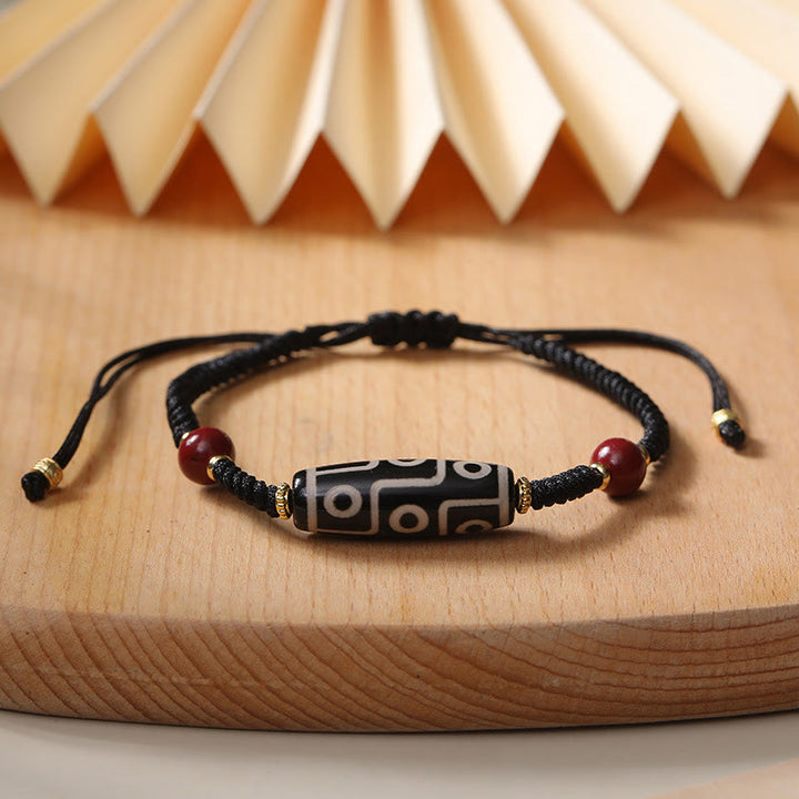 Pulsera de protección de cuentas Dzi tibetana de nueve ojos hecha a mano con Buddha Stones