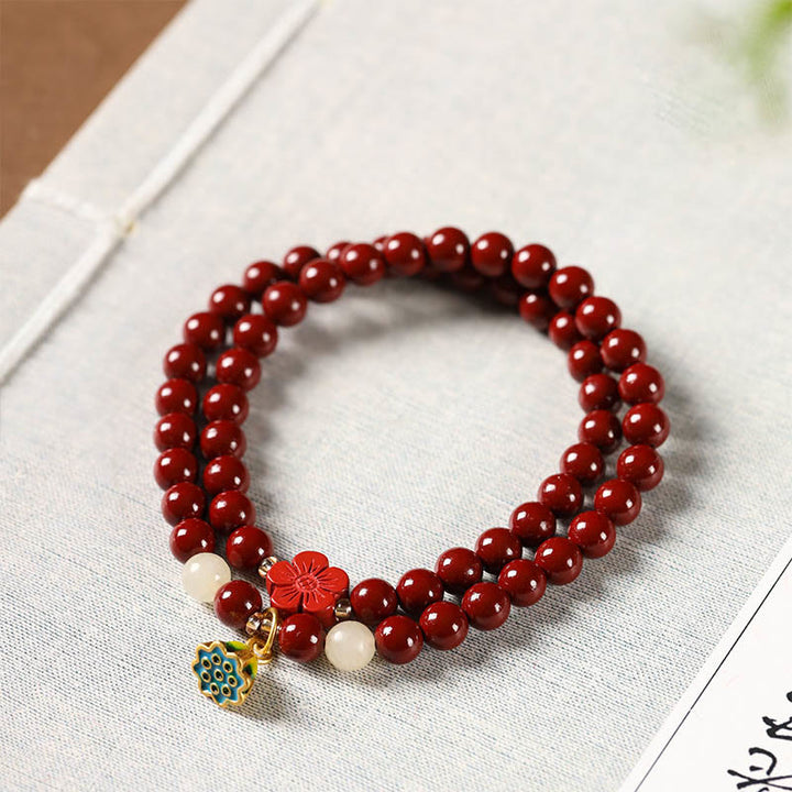 Pulsera de bendición con colgante de loto y cinabrio de Buddha Stones