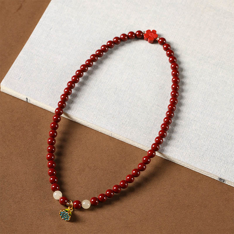 Pulsera de bendición con colgante de loto y cinabrio de Buddha Stones
