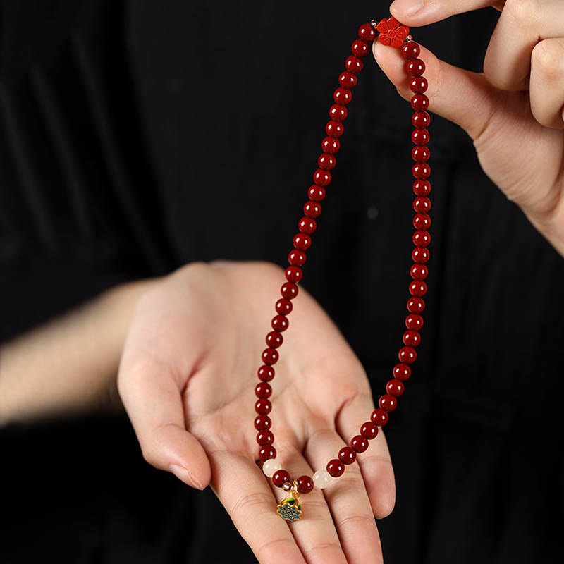 Pulsera de bendición con colgante de loto y cinabrio de Buddha Stones