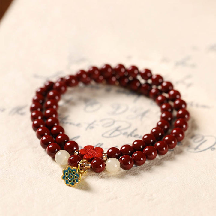 Pulsera de bendición con colgante de loto y cinabrio de Buddha Stones