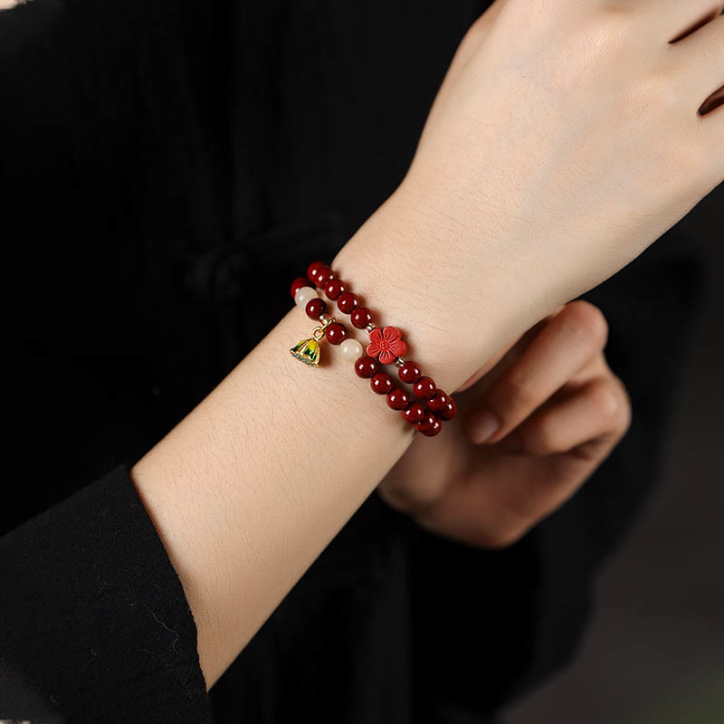 Pulsera de bendición con colgante de loto y cinabrio de Buddha Stones