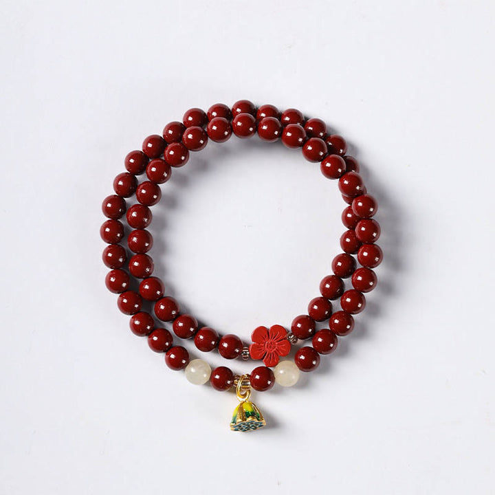 Pulsera de bendición con colgante de loto y cinabrio de Buddha Stones