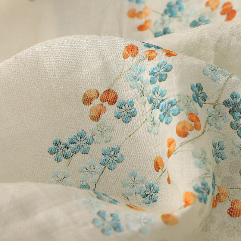 Camisa de manga tres cuartos con botones de rana, flores azules y Buddha Stones, con estampado de hojas naranjas y diseño de piedras de Buda. - image 10