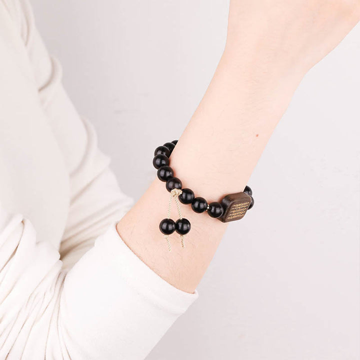 Buda Piedras Pulser Abonín De Madera De Ébano Escritura Grabada Paz Pulsera