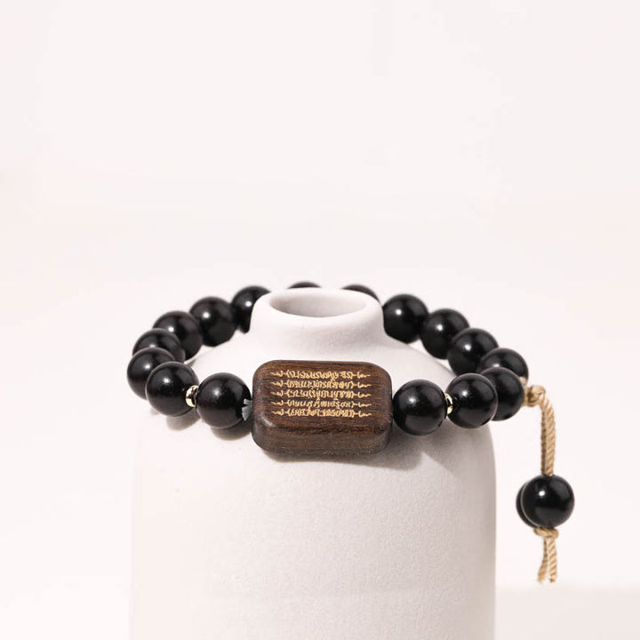 Buda Piedras Pulser Abonín De Madera De Ébano Escritura Grabada Paz Pulsera