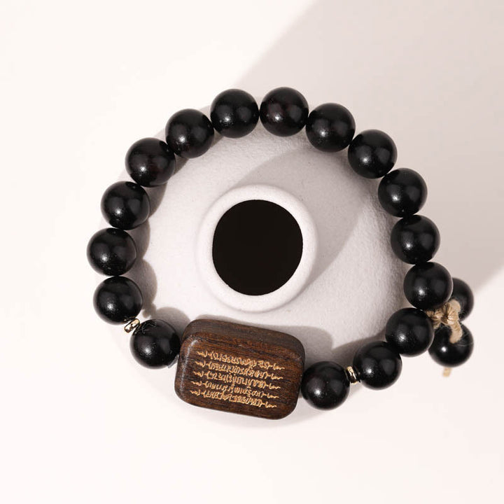 Buda Piedras Pulser Abonín De Madera De Ébano Escritura Grabada Paz Pulsera