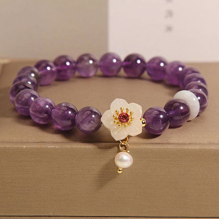 Pulsera de Equilibrio con Piedras de Buda: Amatista Natural, Ágata Blanca, y Perla Encanto