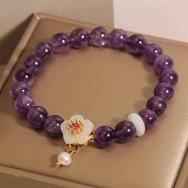 Pulsera de Equilibrio con Piedras de Buda: Amatista Natural, Ágata Blanca, y Perla Encanto