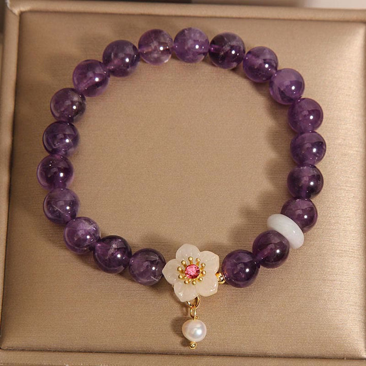 Pulsera de Equilibrio con Piedras de Buda: Amatista Natural, Ágata Blanca, y Perla Encanto