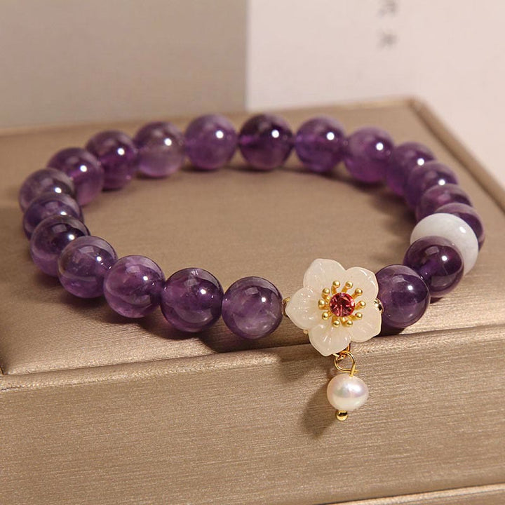 Pulsera de Equilibrio con Piedras de Buda: Amatista Natural, Ágata Blanca, y Perla Encanto