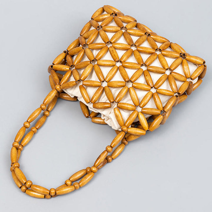 Bolso de mano de cuentas de madera tejidas a mano con piedras de Buda