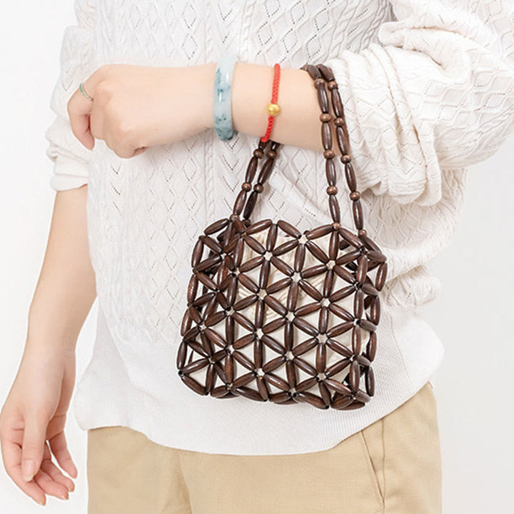 Bolso de mano de cuentas de madera tejidas a mano con piedras de Buda