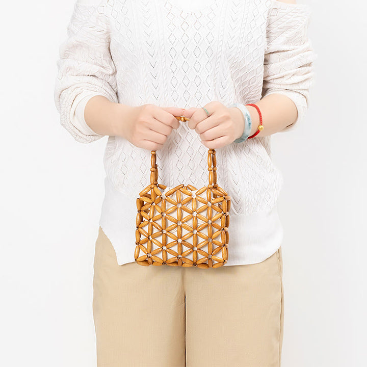 Bolso de mano de cuentas de madera tejidas a mano con piedras de Buda