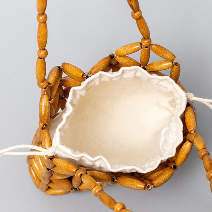 Bolso de mano de cuentas de madera tejidas a mano con piedras de Buda