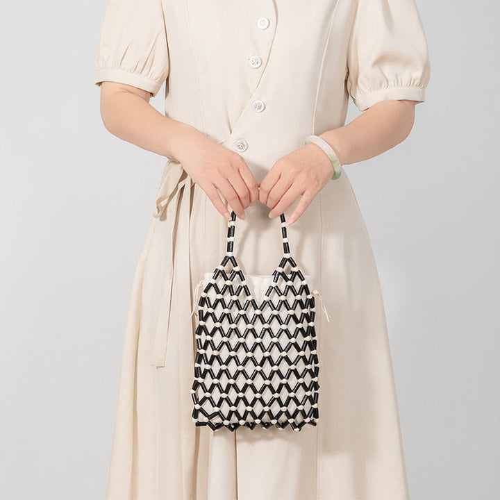 Bolso de mano de cuentas de madera huecas tejidas a mano con mallas de piedra de Buda