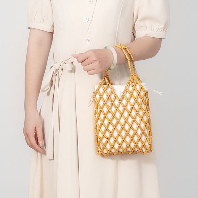 Bolso de mano de cuentas de madera huecas tejidas a mano con mallas de piedra de Buda