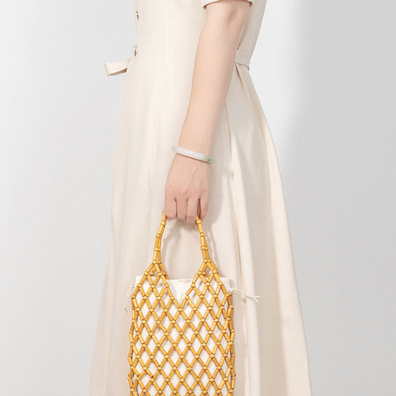 Bolso de mano de cuentas de madera huecas tejidas a mano con mallas de piedra de Buda