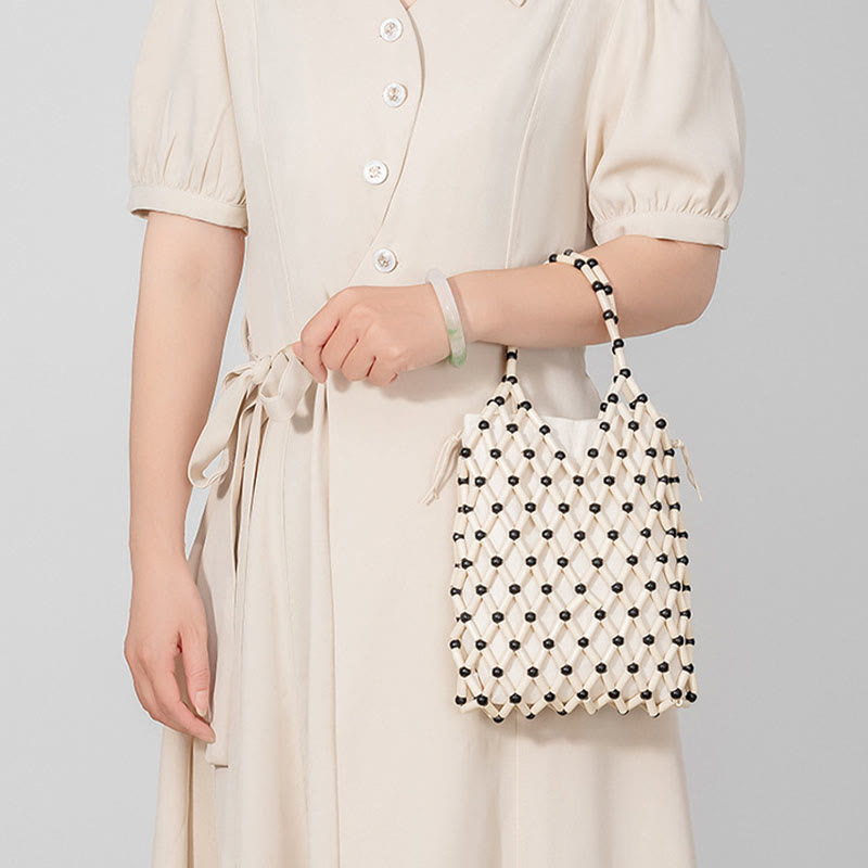 Bolso de mano de cuentas de madera huecas tejidas a mano con mallas de piedra de Buda