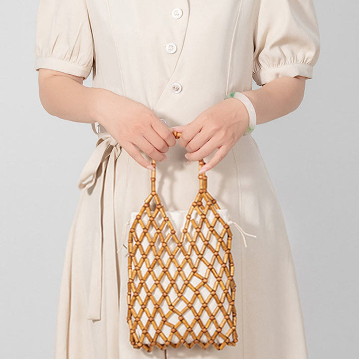 Bolso de mano de cuentas de madera huecas tejidas a mano con mallas de piedra de Buda