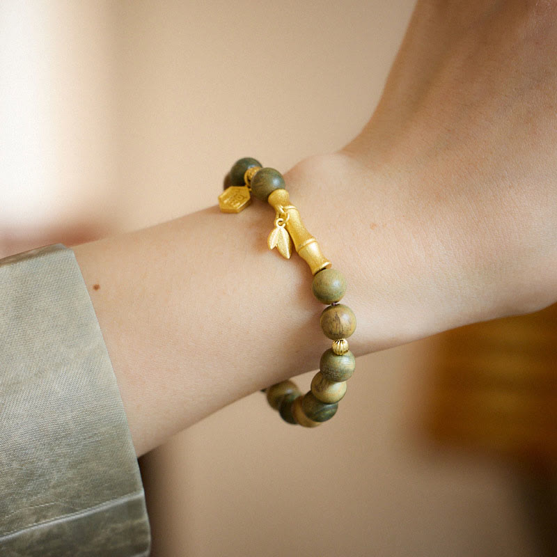 Pulsera calmante de bambú con carácter Fu de madera de sándalo verde Buddha Stones