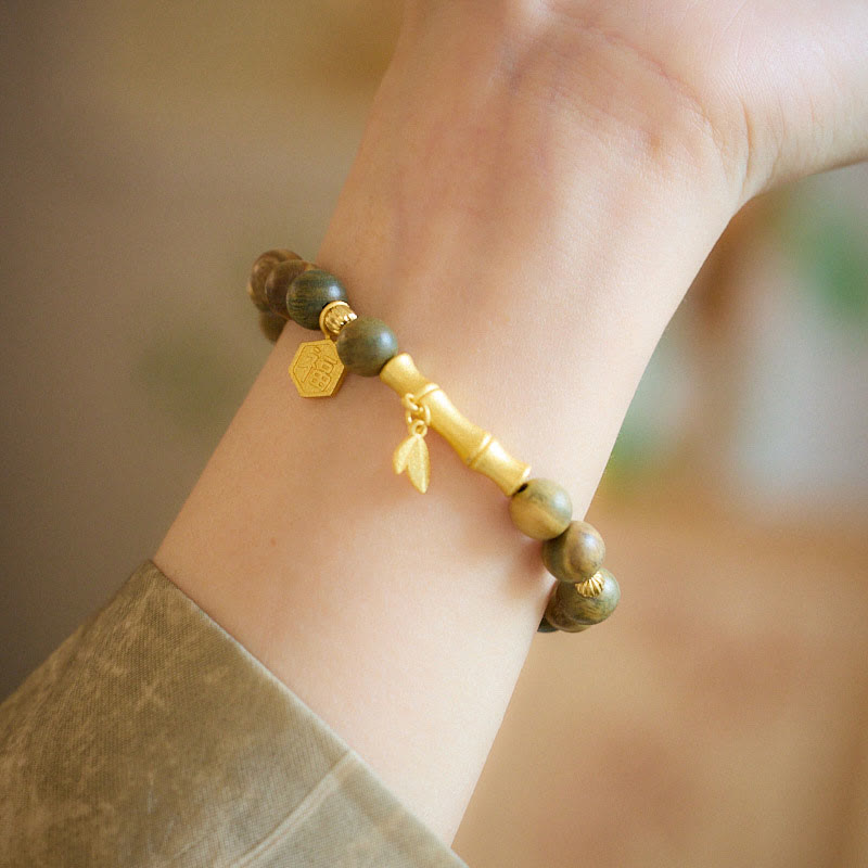 Pulsera calmante de bambú con carácter Fu de madera de sándalo verde Buddha Stones