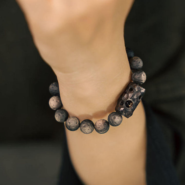 Pulsera Calmante de Piedras de Buda de Obsidiana Plateada Ébano