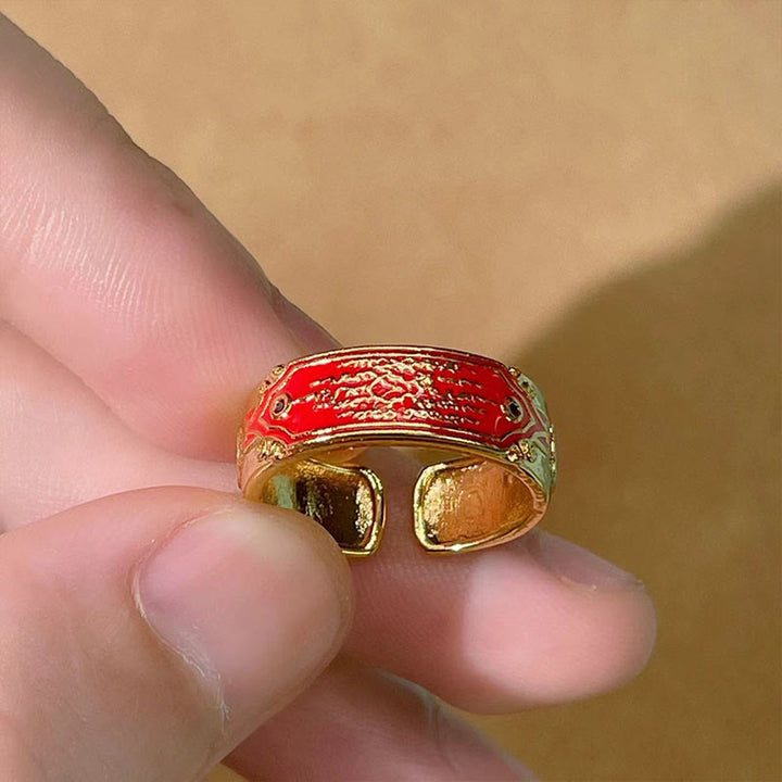 Anillo de curación de cobre con piedras de Buda y cinco escrituras