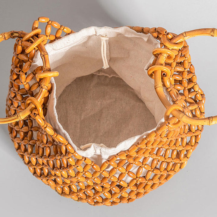 Bolso de hombro tejido a mano de piedras de Buda con asas de bambú