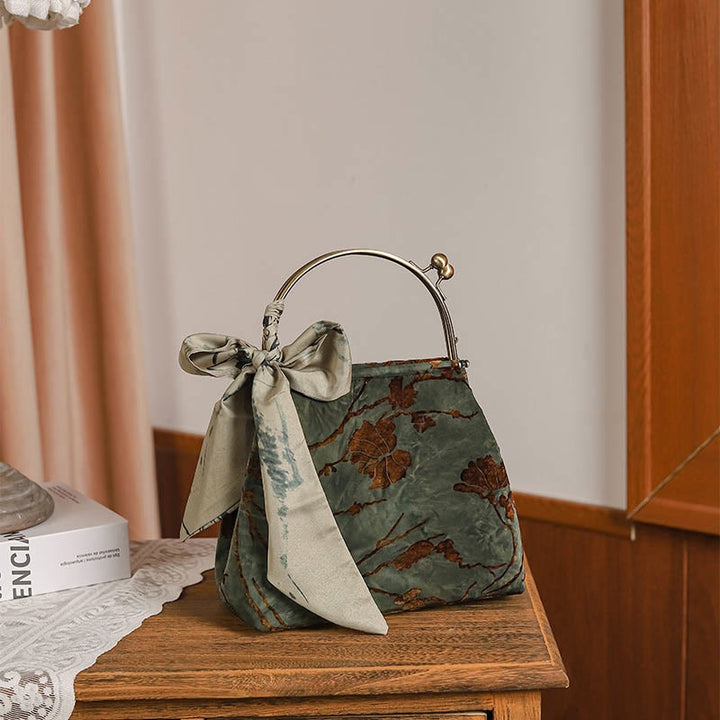 Bolso bandolera de terciopelo con piedras de Buda y cadena de metal