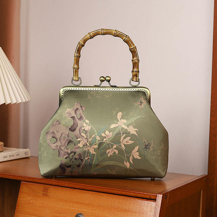 Bolso de mano cruzado con cadena de metal, asa de bambú, piedras de Buda, plantas verdes, montañas